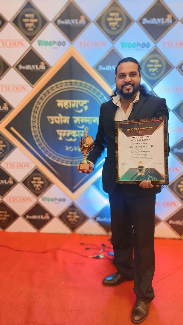 Sachin Raut (Co-Founder & Director) with Trophy