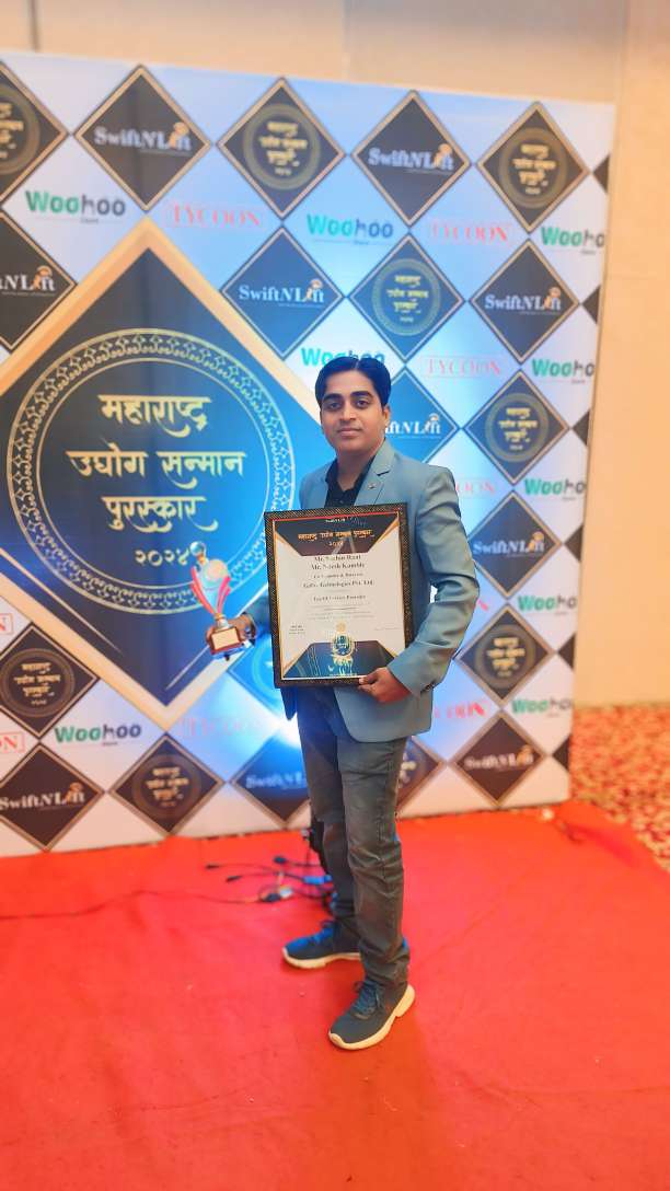 Nilesh Kamble (Co-Founder & Director) with Trophy
